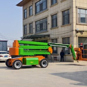 Home Articulated boom lift working at height from the platform