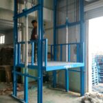 Two tonne cargo lift platform with guardrail and door