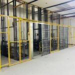 Cargo lift platform deck with anti-skid plate
