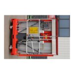 Double mast aluminium lift working at height in a warehouse