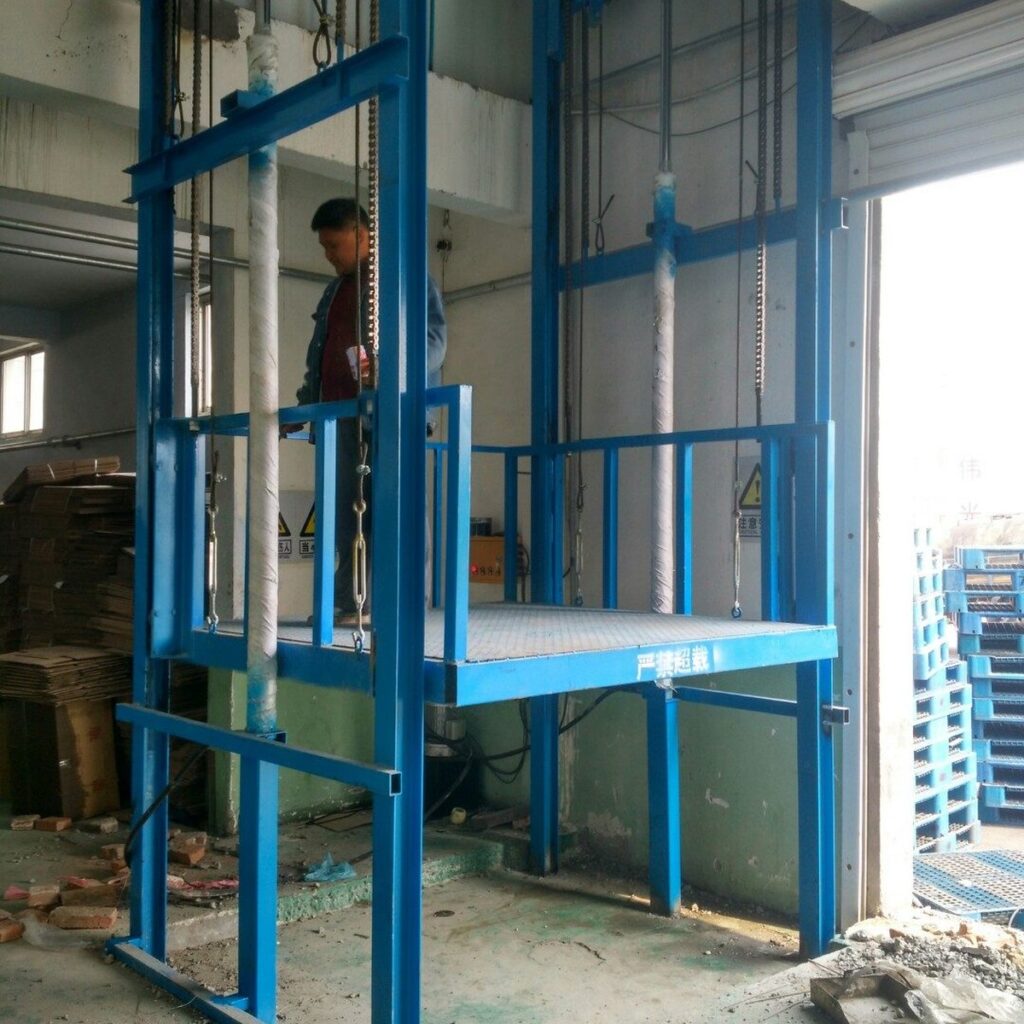 Two tonne cargo lift platform with guardrail and landing gate