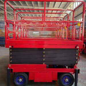 Hand-push scissor lift with the outriggers extended